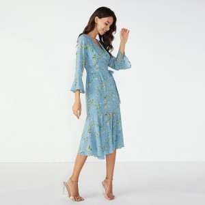 Abito invernale blu fantasia con disegni fantasia africana