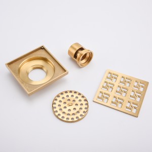 Scarico superficiale della doccia nel pavimento di cemento