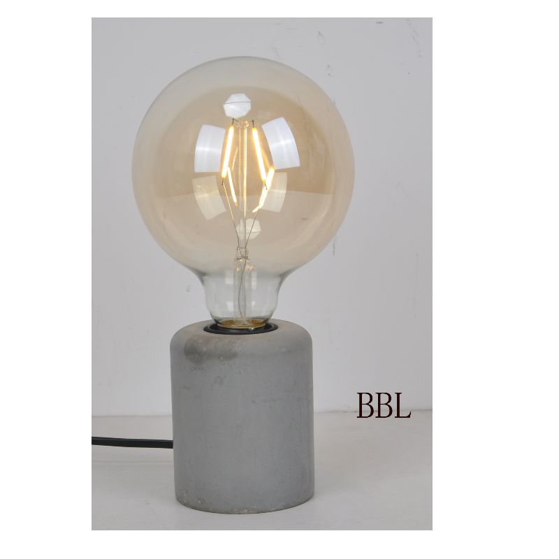 Lampada da tavolo con base in cemento a colonna