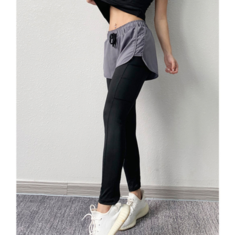 Esercizio moda donna Pantaloni da ginnastica finti in due pezzi per yoga
