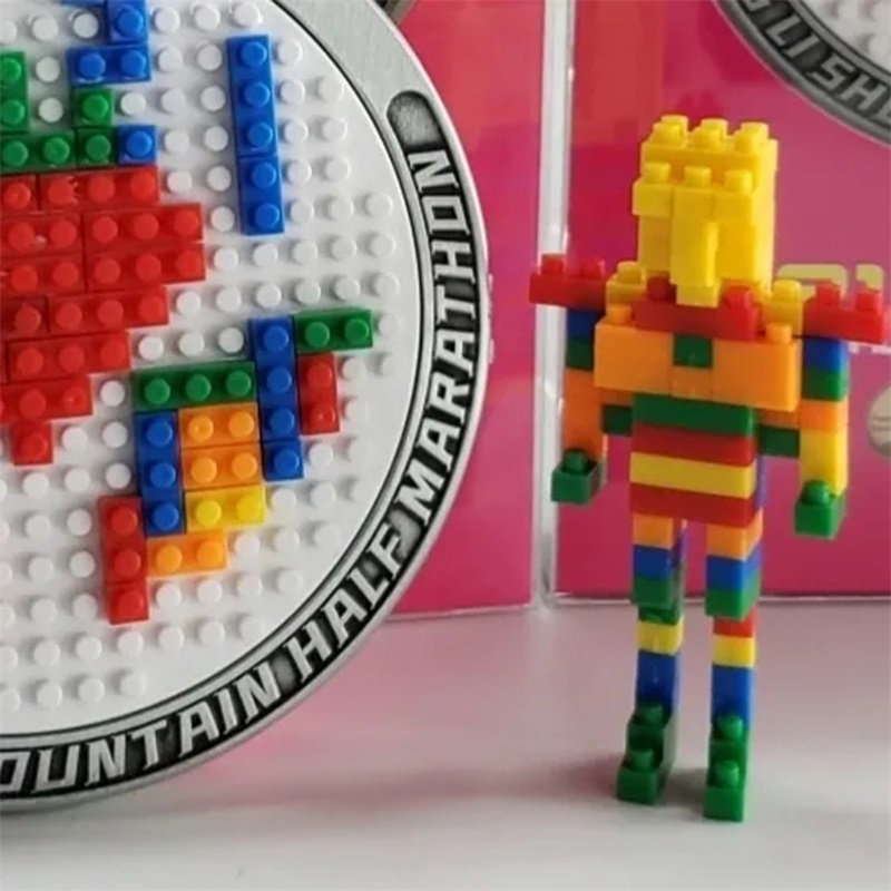 Design di medaglie premio Lego che suona ciondolo medaglione