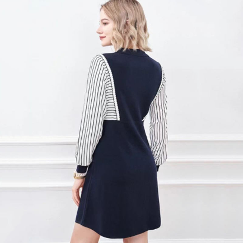Autunno all'inizio del piccolo colletto inverso a metà cardigan