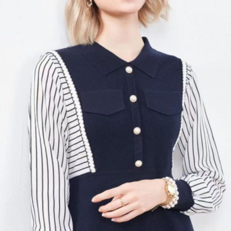 Autunno all'inizio del piccolo colletto inverso a metà cardigan